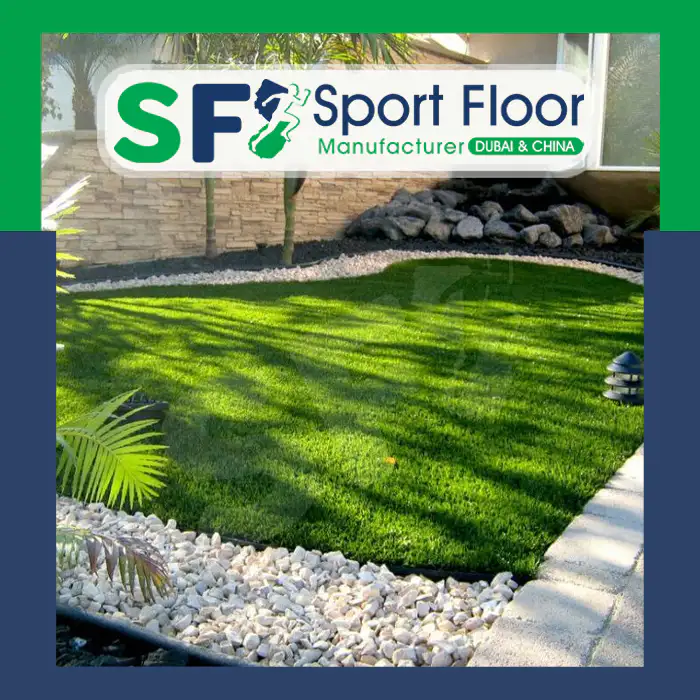 Artificial grass used in a residential garden with decorative stones