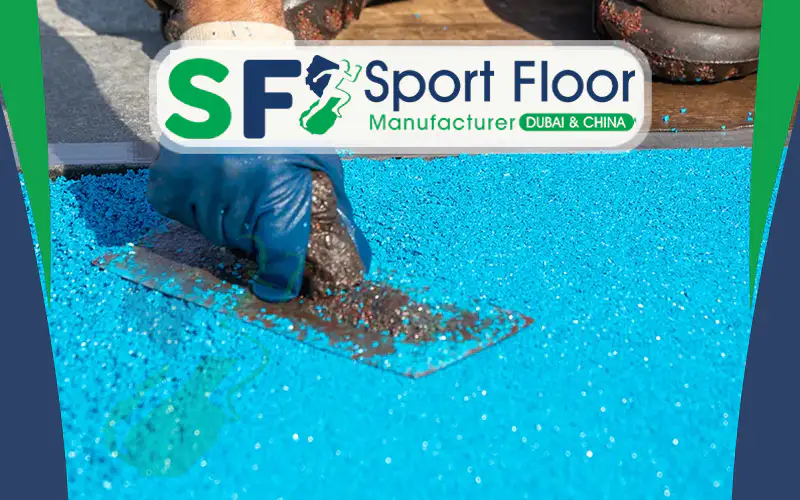 Manual application of blue polyurethane bound granule surface