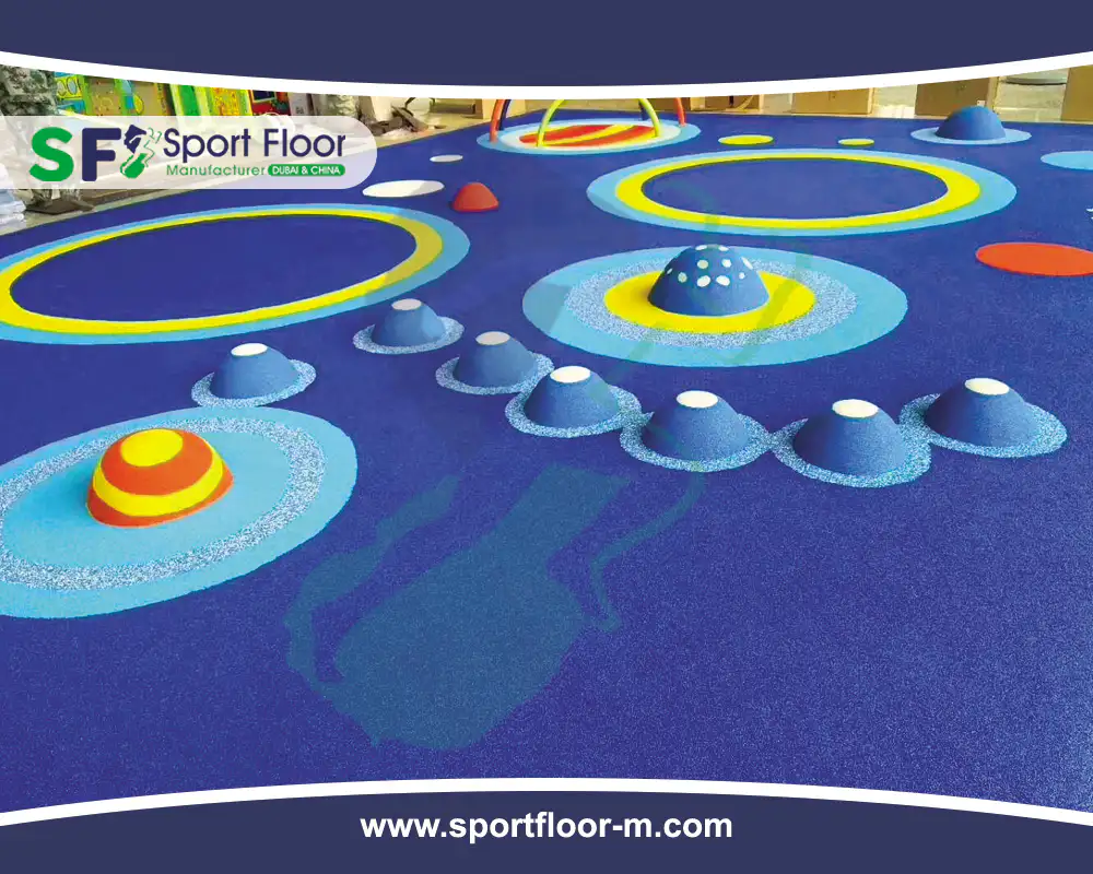Blue recreational polyurethane surface with colorful activity zones