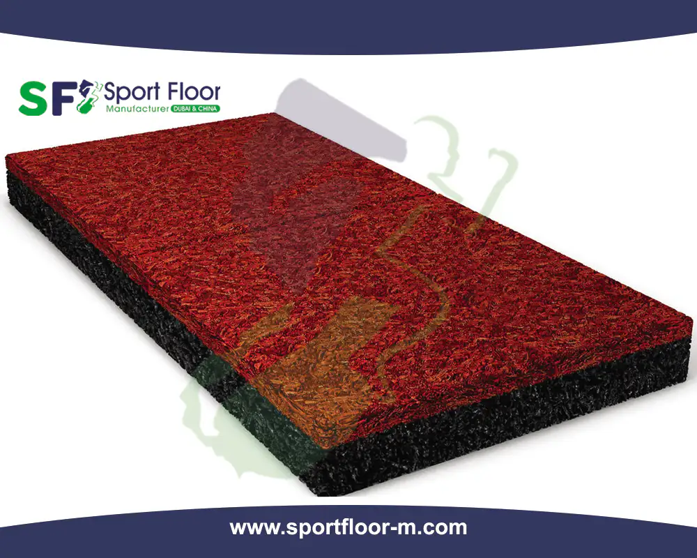 Red polyurethane and rubber sports surface system sample showing layered construction