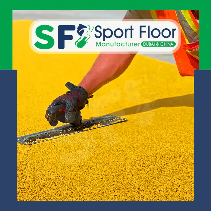 Manual trowel application of a yellow polyurethane surface