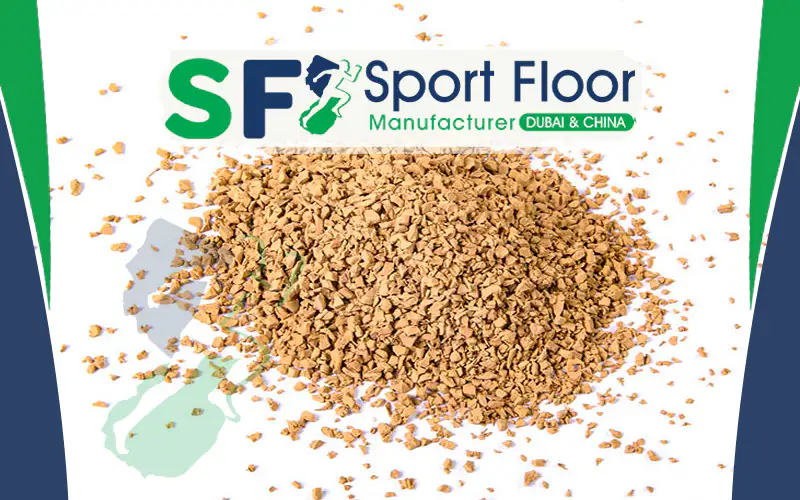 Tan colored rubber granules for sports and recreational surfaces