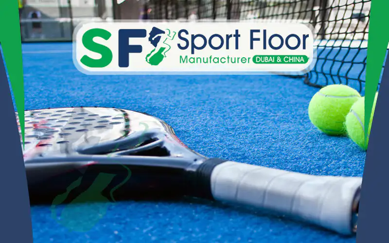 Blue artificial grass padel court with a padel racket and balls