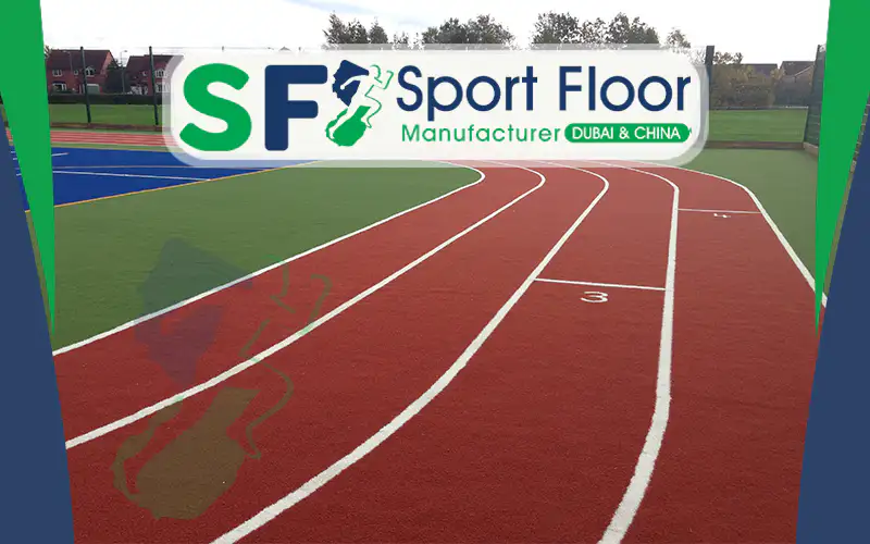 Artificial sports field beside a school running track