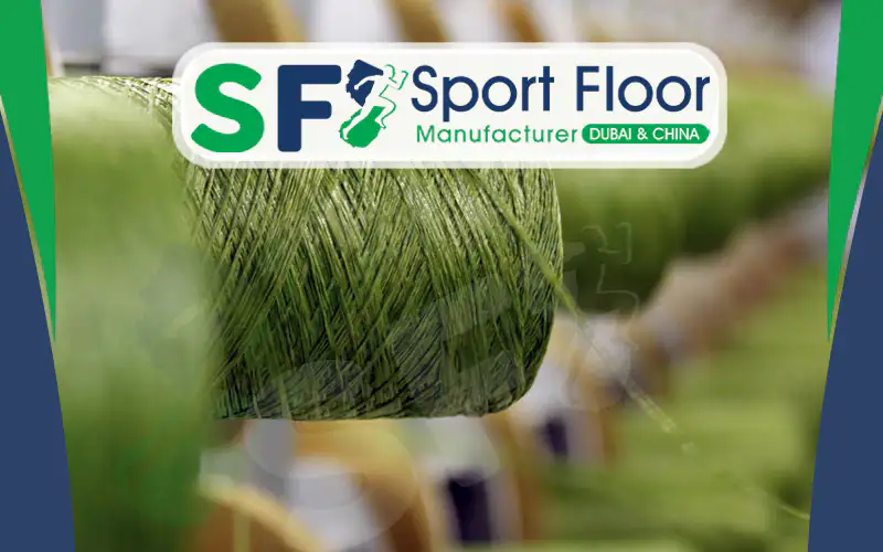 Artificial grass fibers during yarn manufacturing