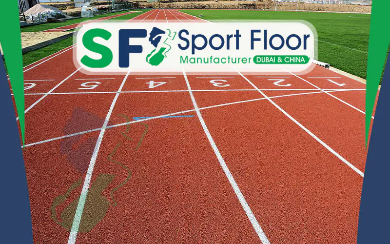 Red running track start area with numbered lanes
