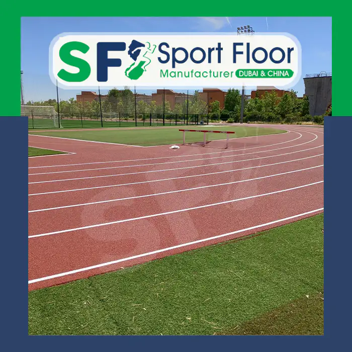 Outdoor red running track beside a sports field
