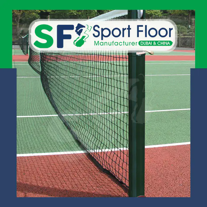 Tennis net post and net on a green and red court