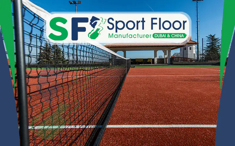 Tennis net installed over a red synthetic court surface