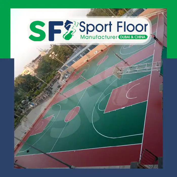 Green and red acrylic basketball court facility viewed from above
