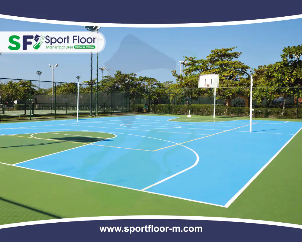 Blue and green outdoor acrylic basketball court with clear white markings