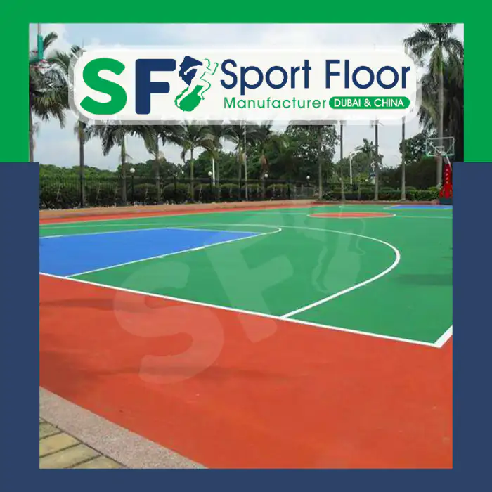 Green acrylic basketball court with orange surrounding surface