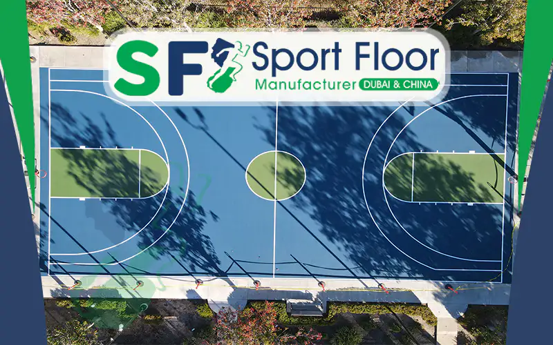 Aerial view of blue basketball court with green key areas