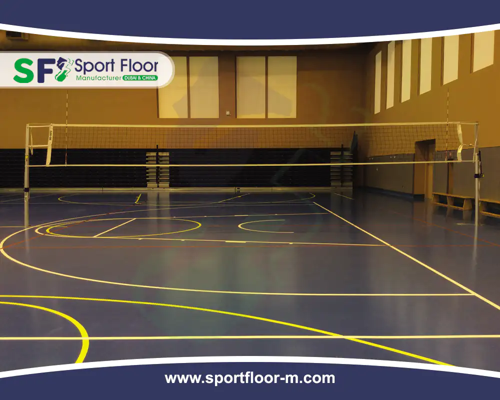 Indoor multi-sport court with volleyball net and multiple line markings