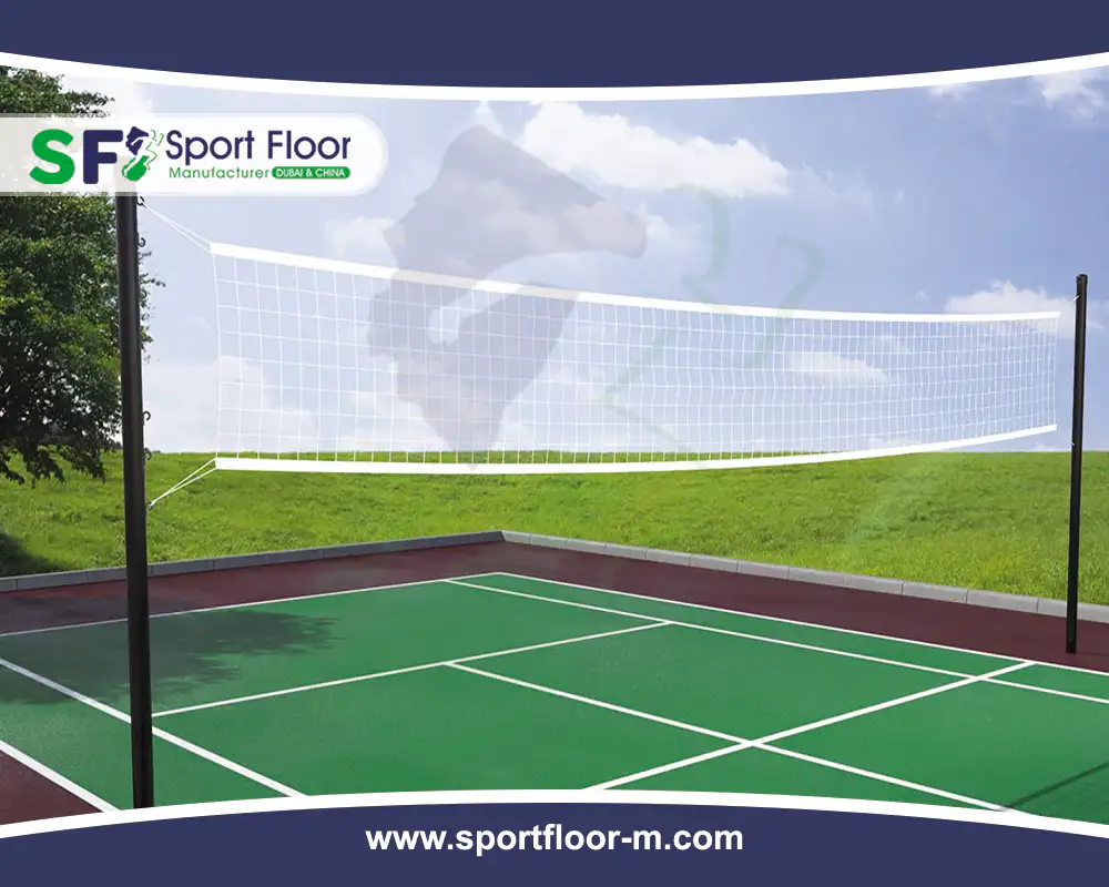 Green acrylic volleyball court with net and surrounding landscape