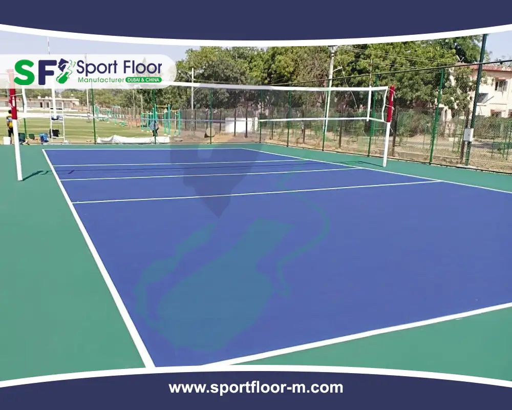 Outdoor blue and green polyurethane volleyball court with net and posts
