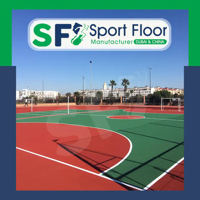Green and red outdoor multi-sport court with handball goal