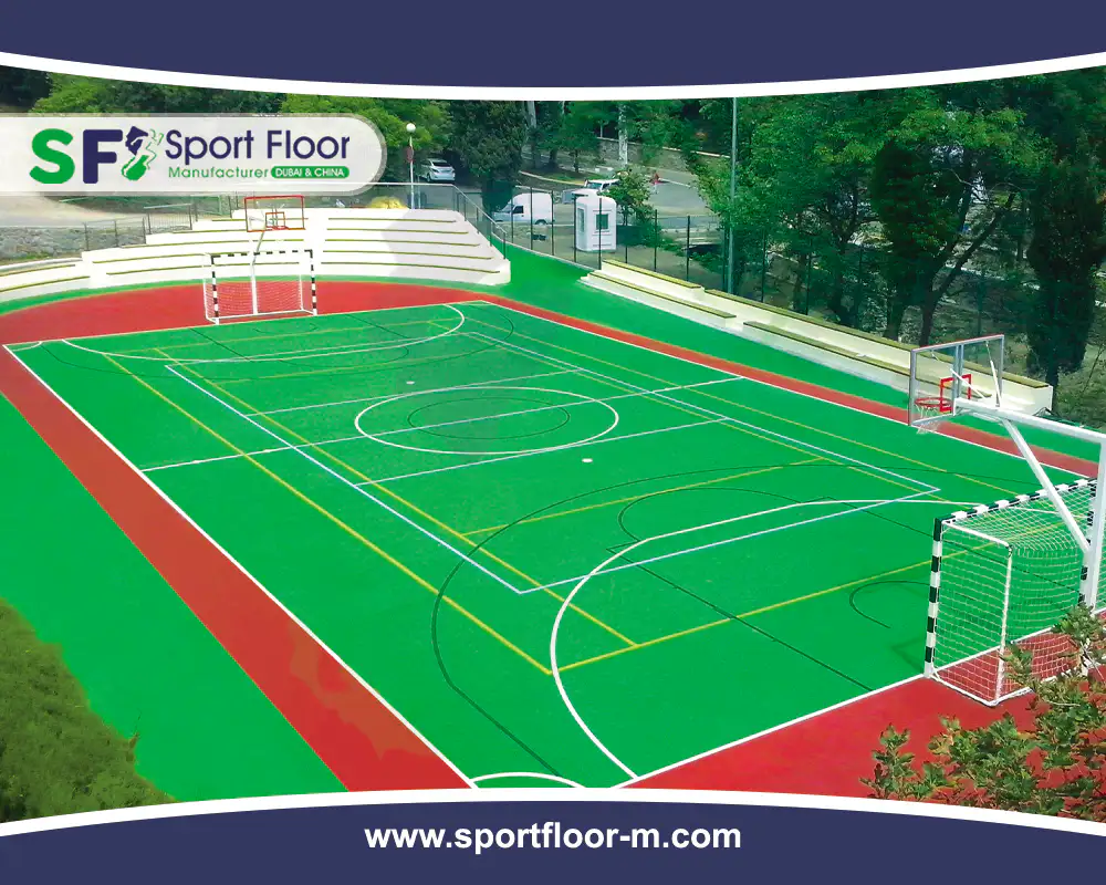 Green and red outdoor multi-sport acrylic court with handball goals and markings