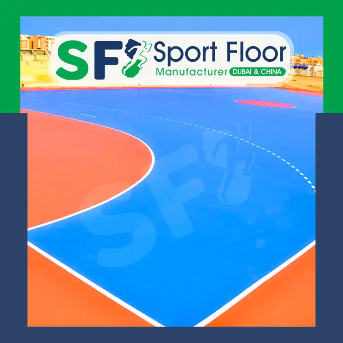 Blue and orange outdoor acrylic court with curved handball markings