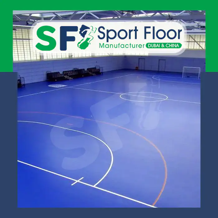 Blue indoor court with handball markings and goals