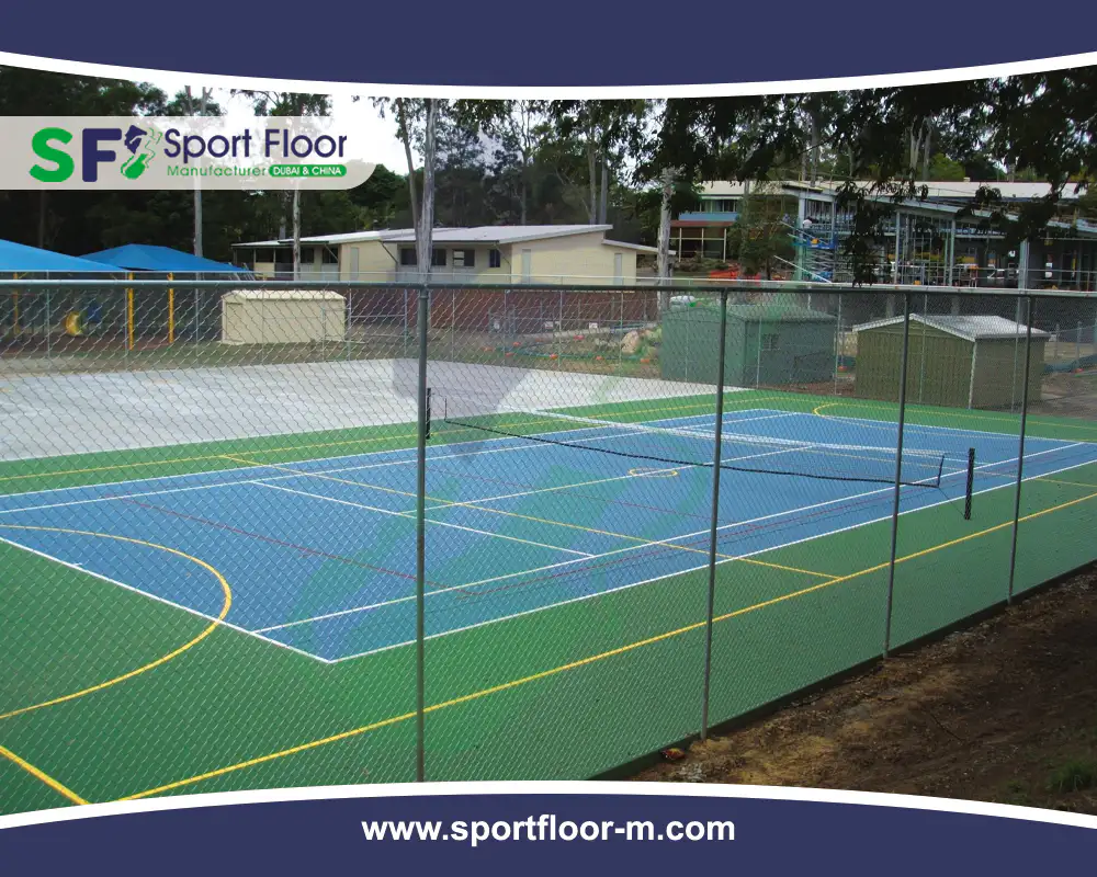 Fenced blue and green outdoor multi-sport court