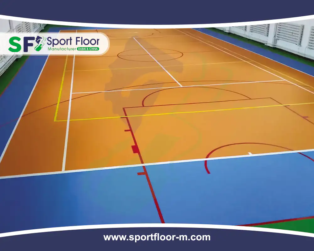 Indoor orange and blue sports floor with several court lines