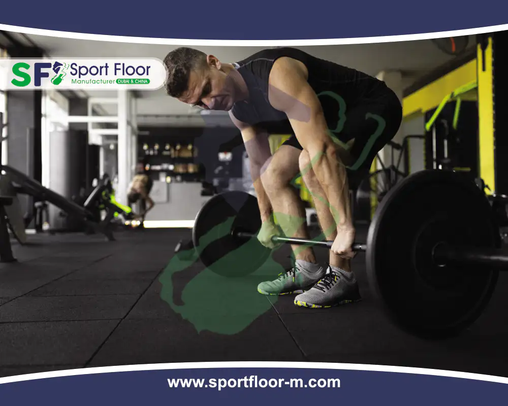Black rubber tiles in a gym weightlifting zone