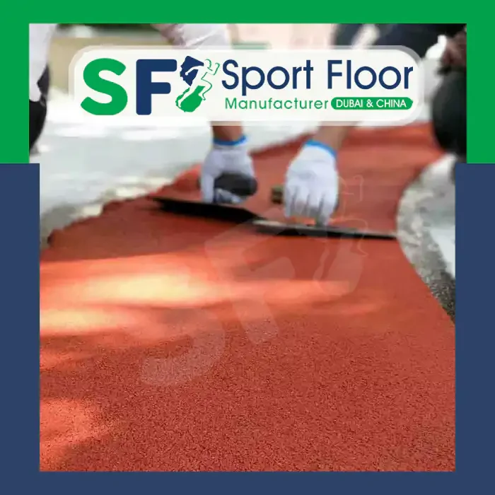 Installing red EPDM wet pour surface