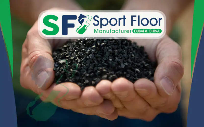 Cupped hands holding black SBR rubber granules