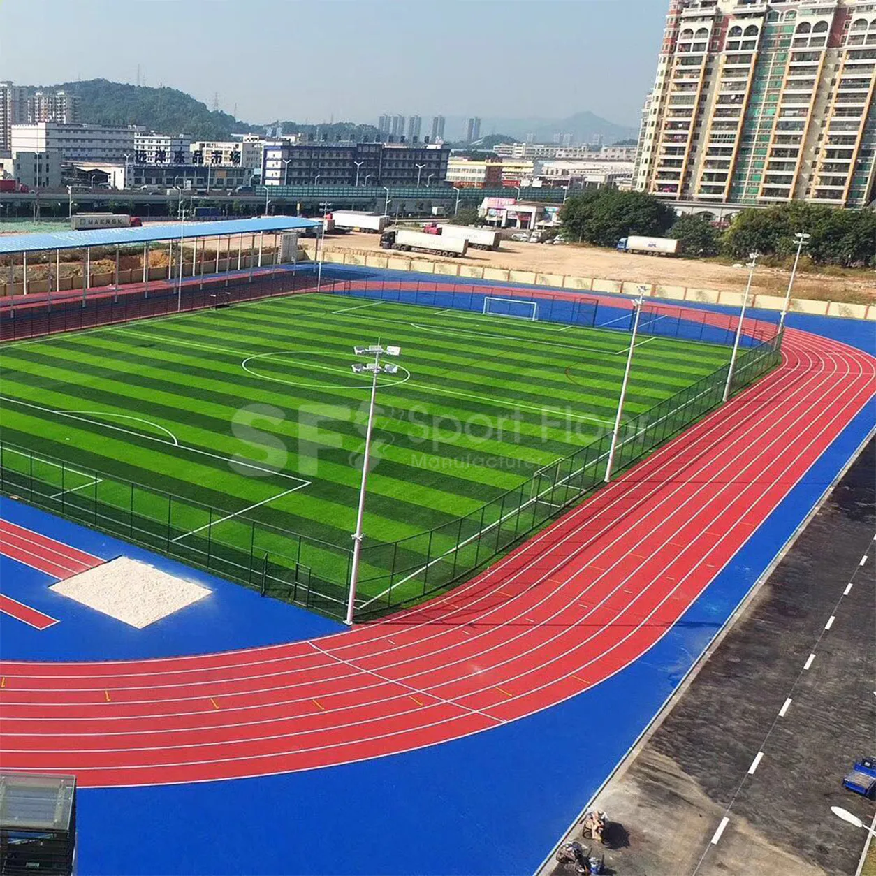 ملعب كرة قدم بالعشب الصناعي من أعمال Sport Floor